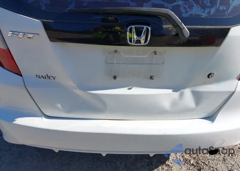 2009 Honda Fit from USA, damaged, VIN JHMGE88229S009402